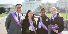 Four Alzheimer's Association advocates standing in front of a legislative building.