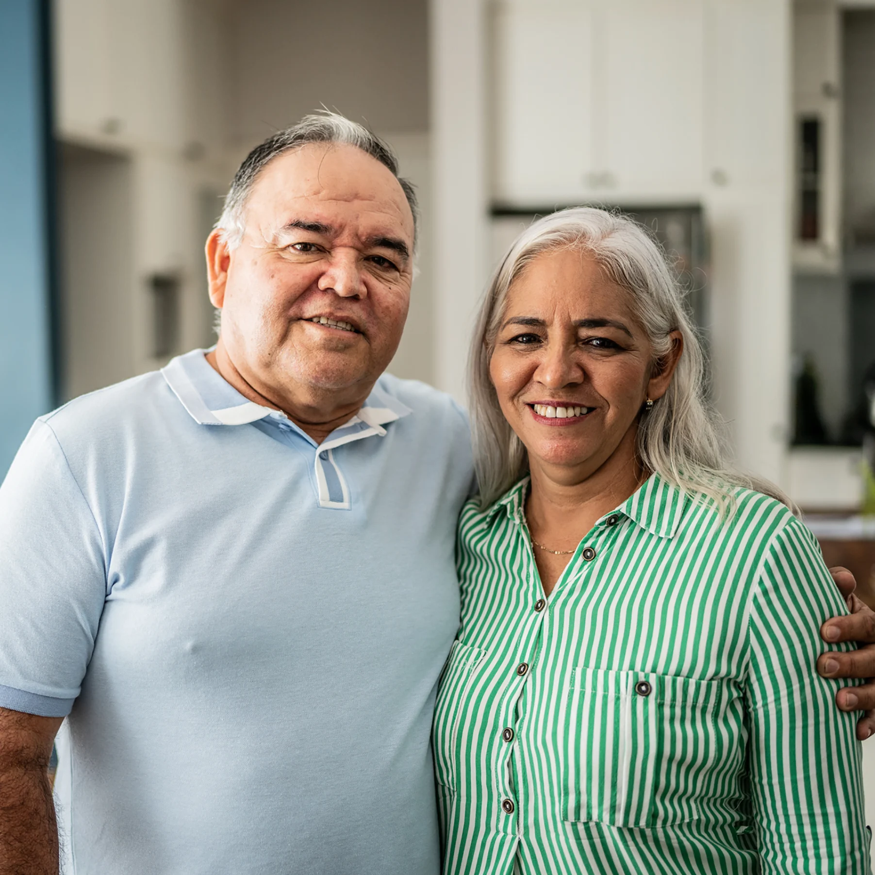 Husband and wife smiling