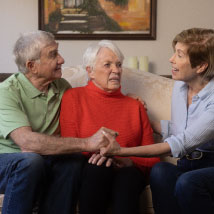 Image of family members holding hands