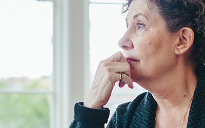 Woman looking out a window