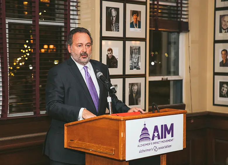 Man speaking at podium