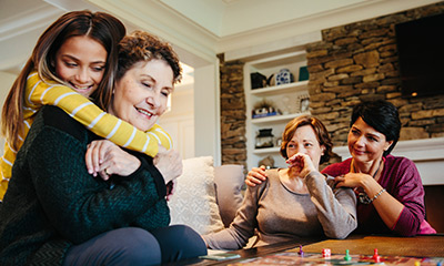 Family playing board game